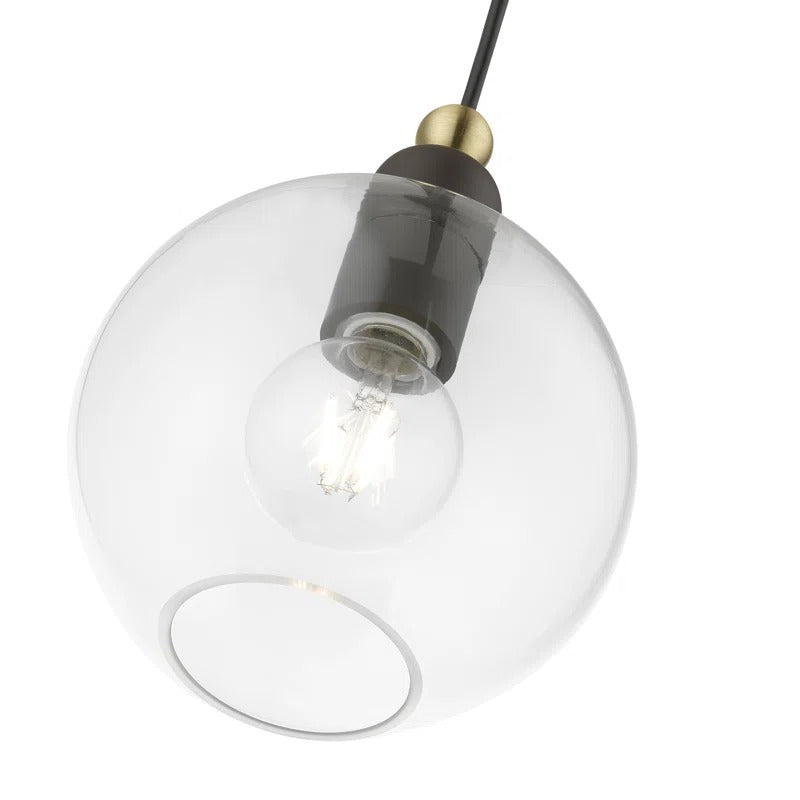 Elle Minimalist Clear Glass Dome Pendant Light detail1.webp__PID:a2cb3045-20e0-4caf-b7e7-275d17c7d3b8